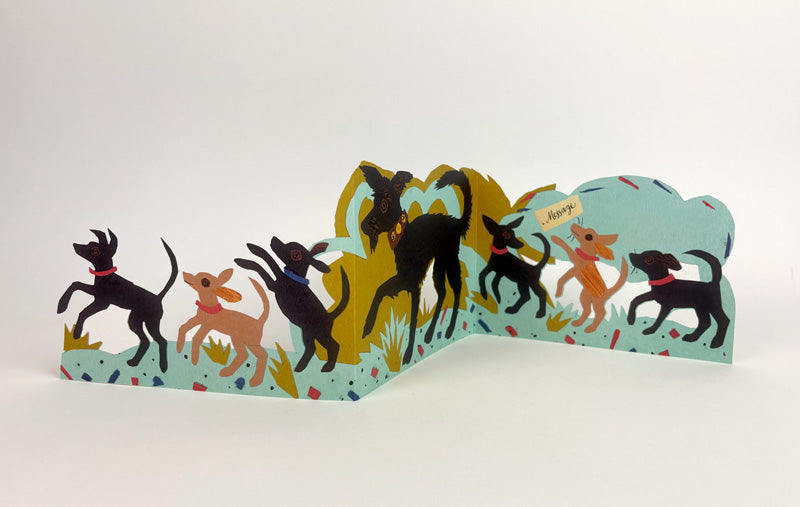 Puppy Parade pop- up greetings card by Mark Hearld