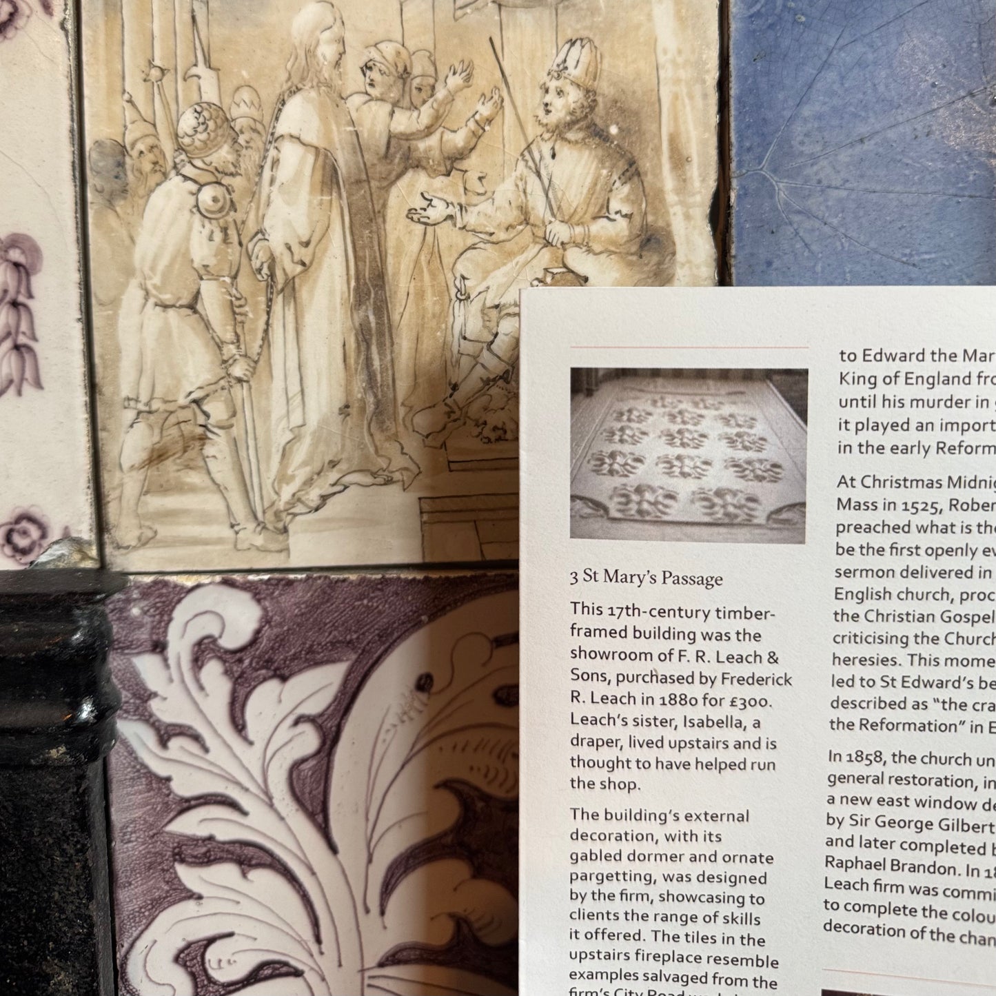 Decorative architectural elements with text overlay on a textured background