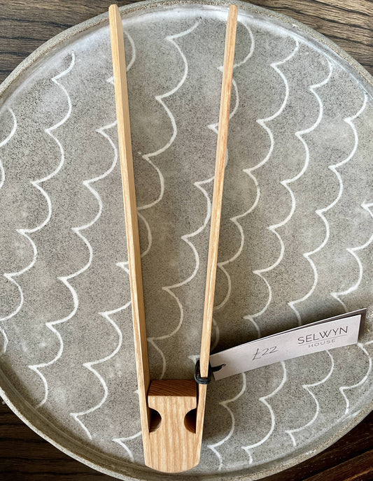 Tongs in ash by Selwyn House