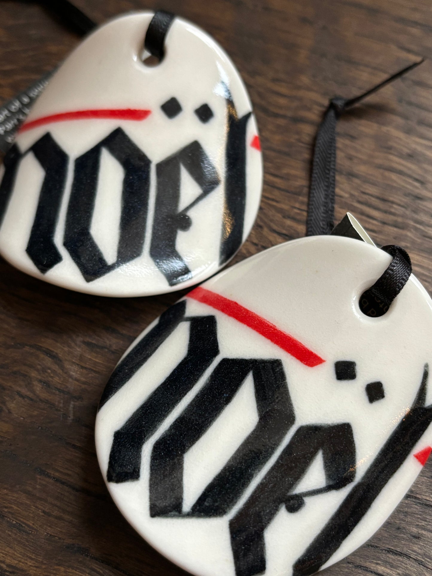 Noel Ornament by David Stonehouse